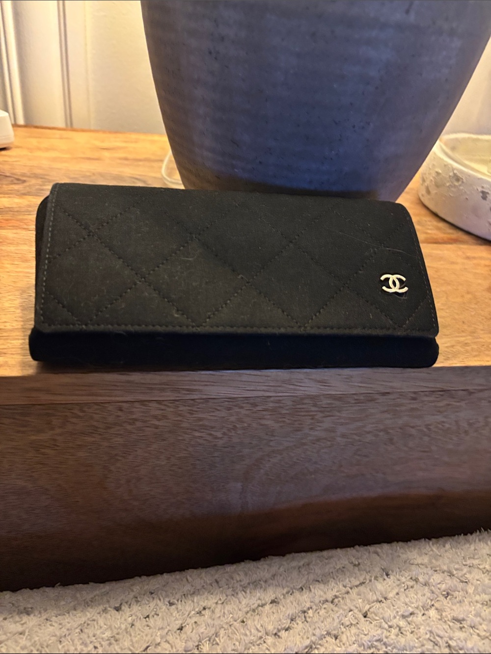 CHANEL Black Quilted Wallet with Gold CC Emblem